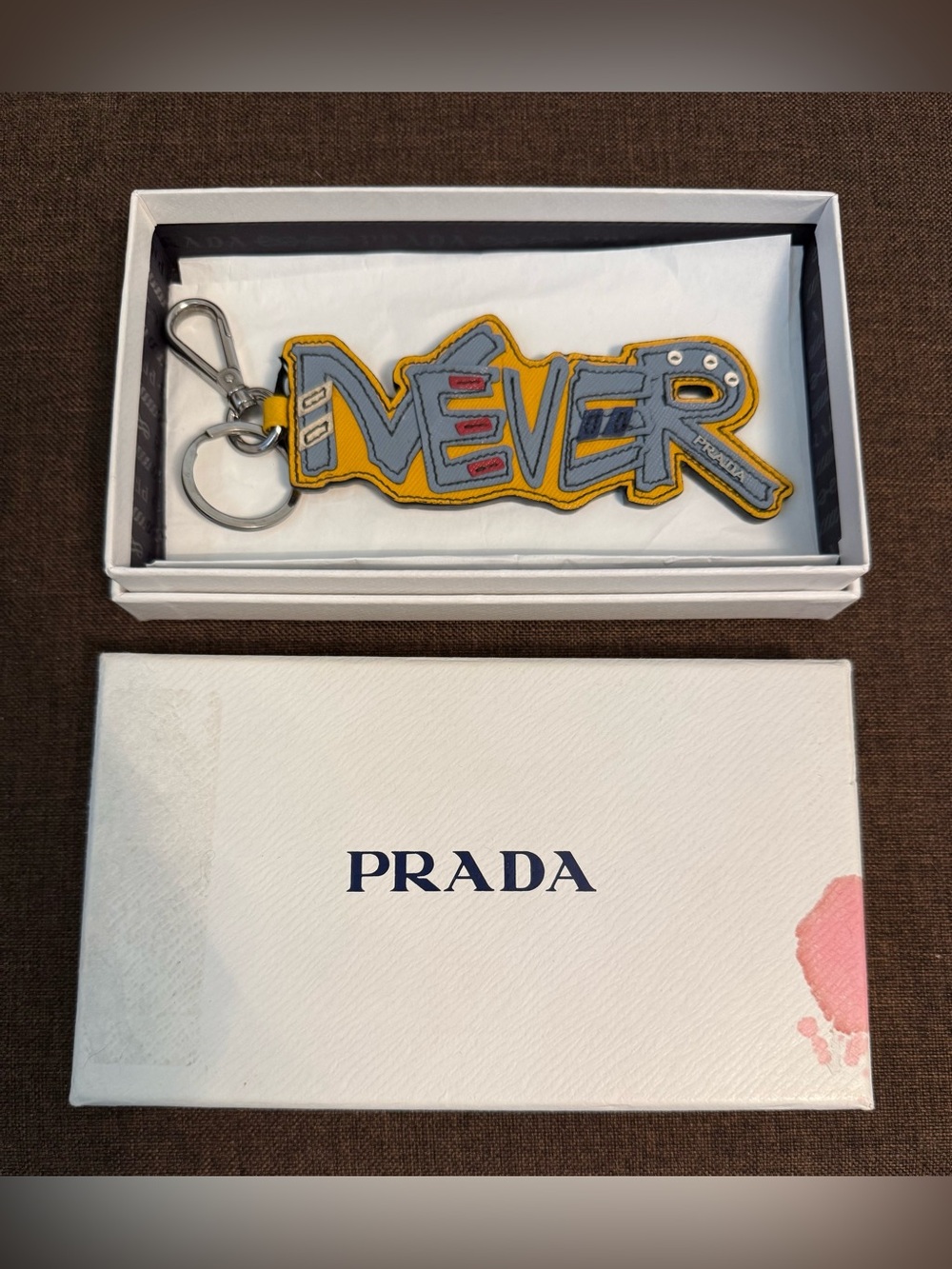 Authentic “NEVER” Prada Saffiano Leather Graffiti Keychain / Bag Charm with COA